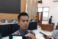 Divisi Sosialisasi, Pendidikan Pemilih, Partisipasi Masyarakat, dan Sumber Daya Manusia (Sosdiklih Parmasy) KPU Tuban, Gunawan Wihandono(Foto: Assayid Annazili/Liputansatu.id).