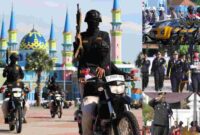 Parade Kompi dan Kendaraan Taktis Polri dalam upacara puncak hari Bhayangkara ke-79, (Assayid Annazili/Liputansatu.id).