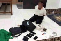 Polisi amankan pelaku copet yang beraksi ditengah keramaian Haul Sunan Bonang, (Assayid Annazili/Liputansatu.id).